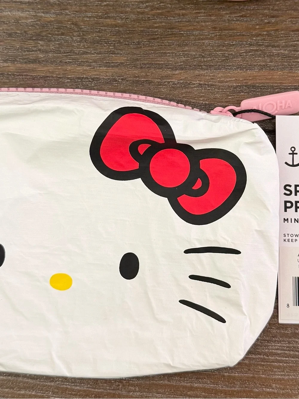 ALOHA Collection White Hello Kitty Face Mini Pouch